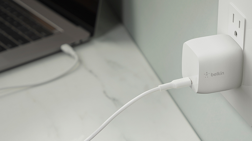 BOOST↑CHARGE USB-C GaN Wall Charger plugged into an outlet